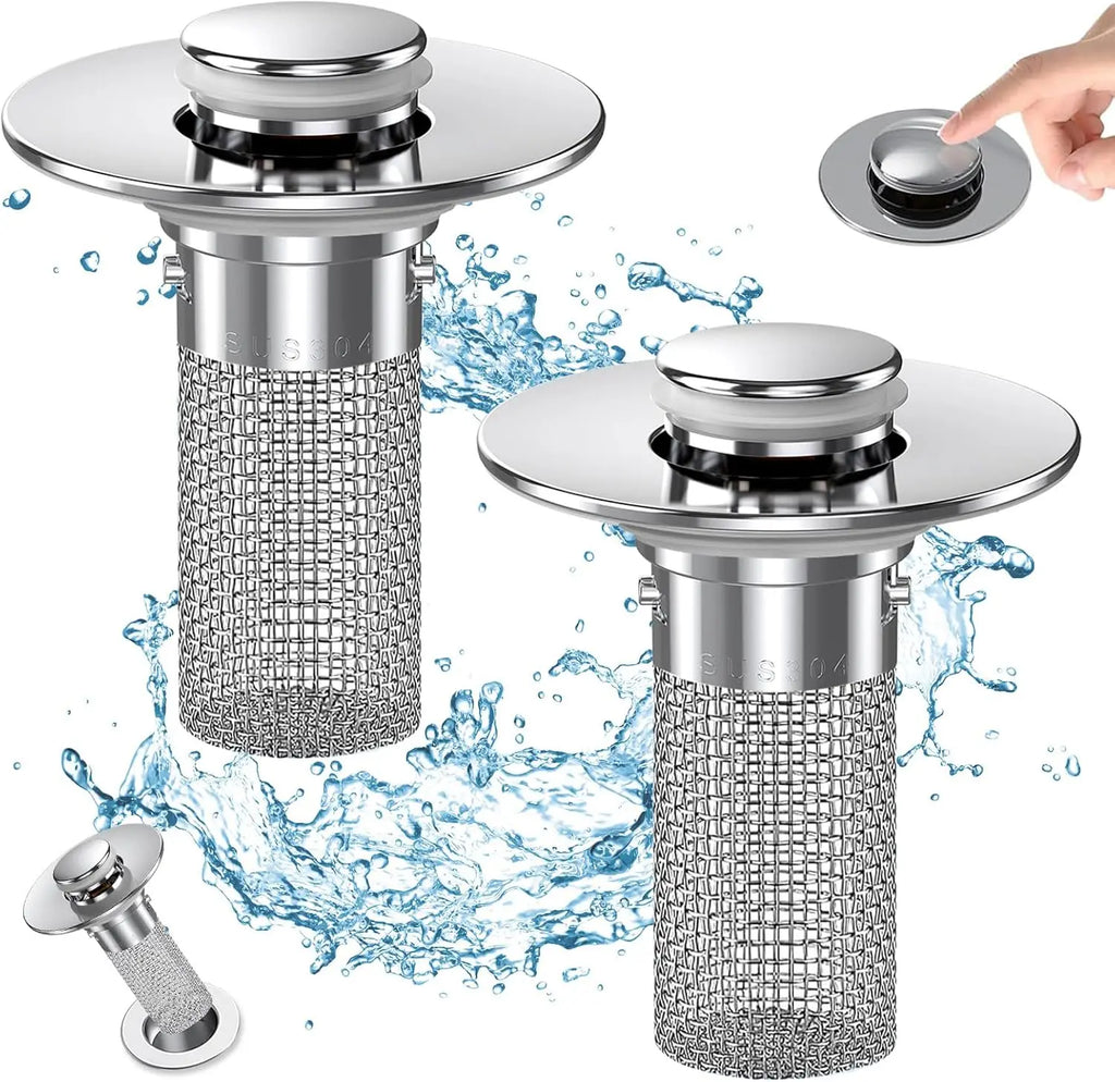 Two silver sink drain covers with mesh filters on a white background with water splashes.