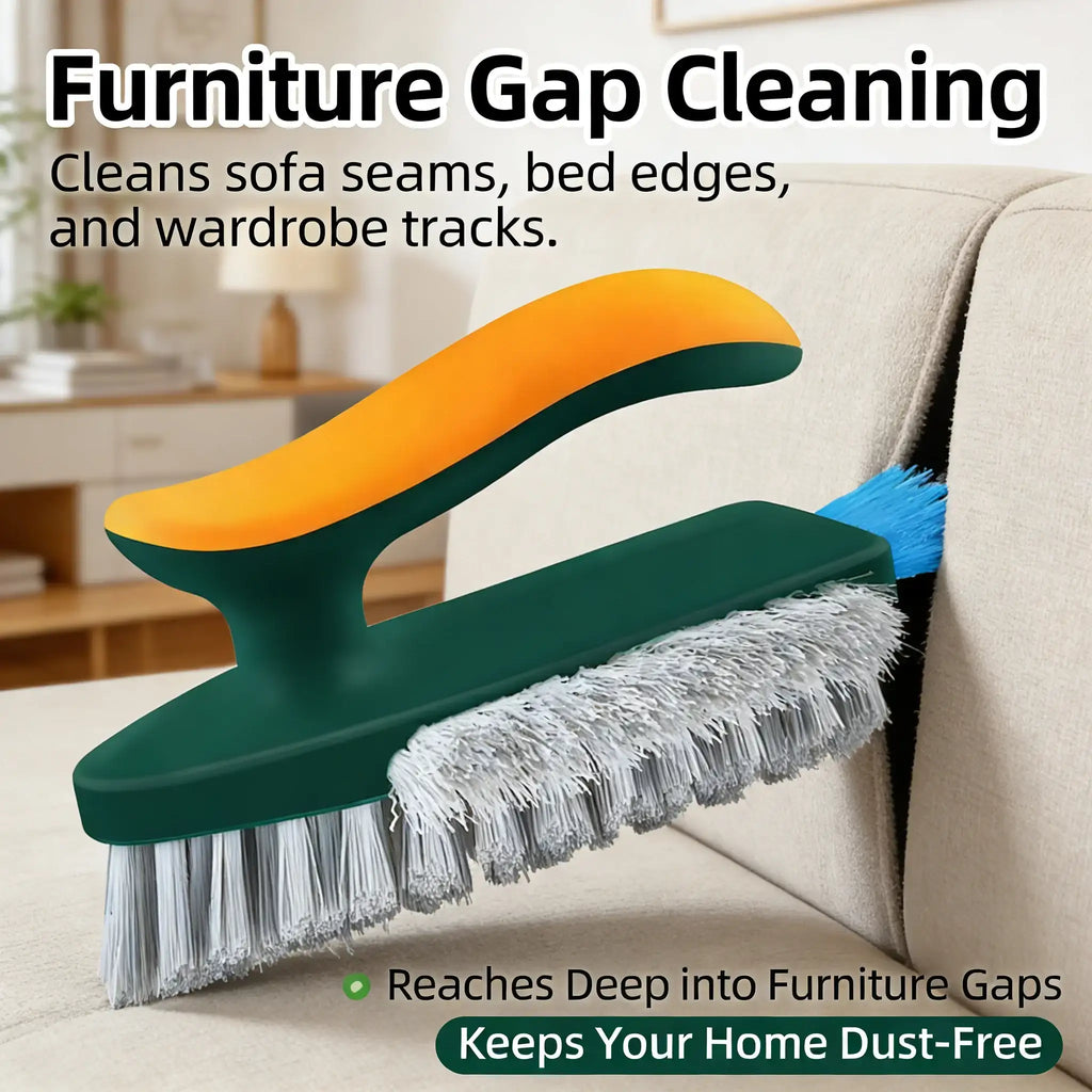 Cleaning brush with green and orange handle cleaning furniture gaps on a sofa.
