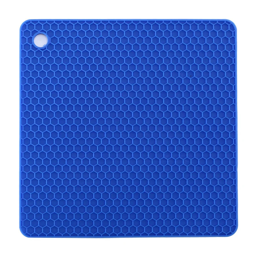 Blue silicone mat with honeycomb pattern on a white background