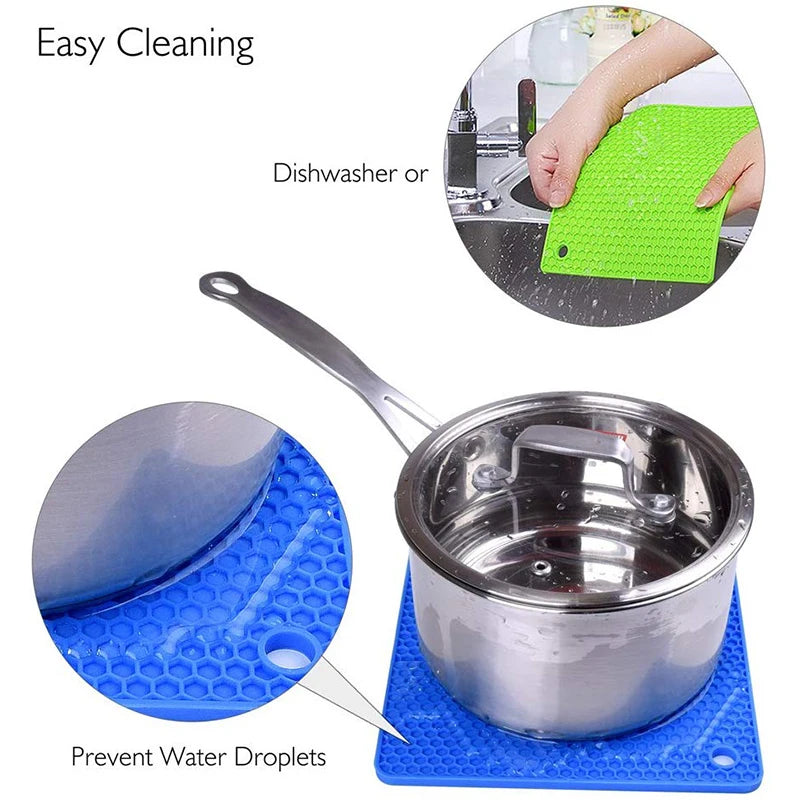 Stainless steel pot on a blue silicone mat with text about easy cleaning.