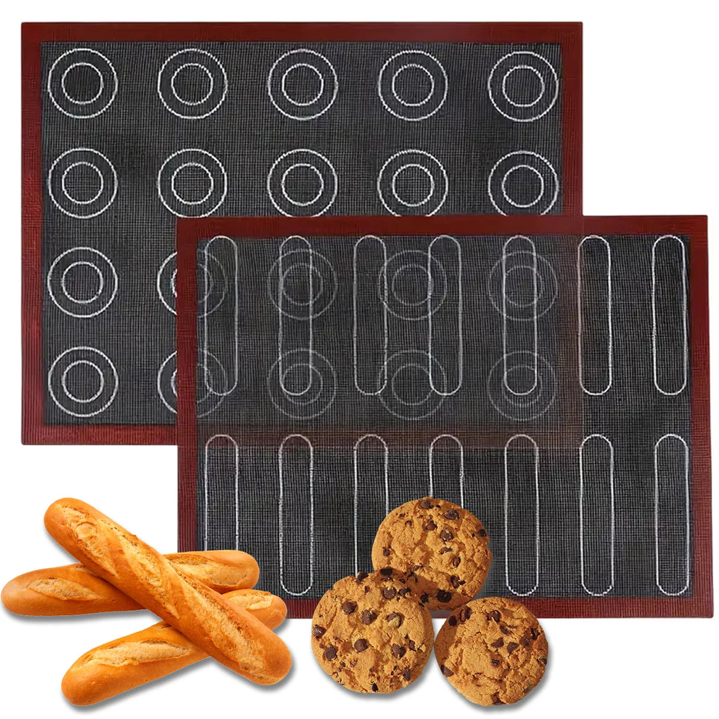 Two baking mats with different patterns, one with circular shapes and the other with rectangular slots, accompanied by bread and cookies on a white background.