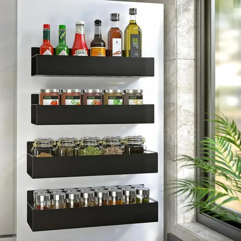 Black wall-mounted spice rack with various condiments and jars on a white wall.