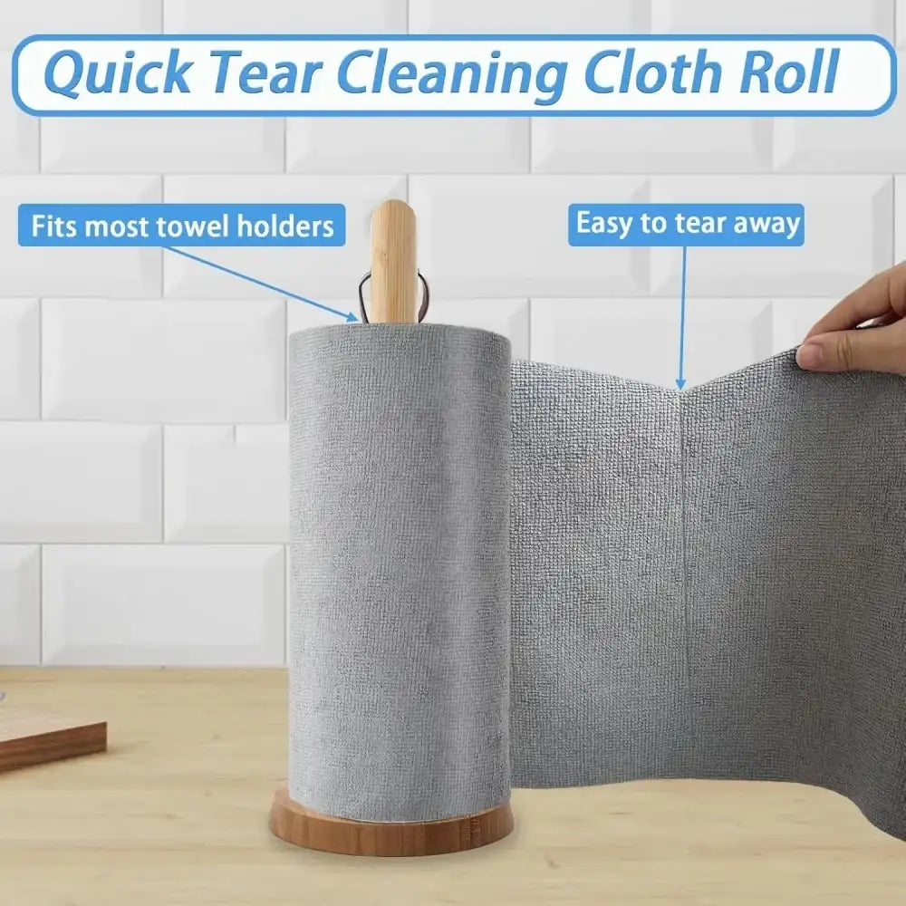 Roll of quick tear cleaning cloth with wooden holder on a tiled wall background