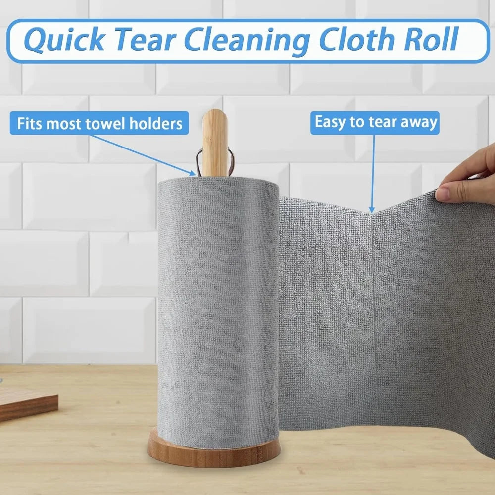Roll of quick tear cleaning cloth with wooden holder on a tiled wall background