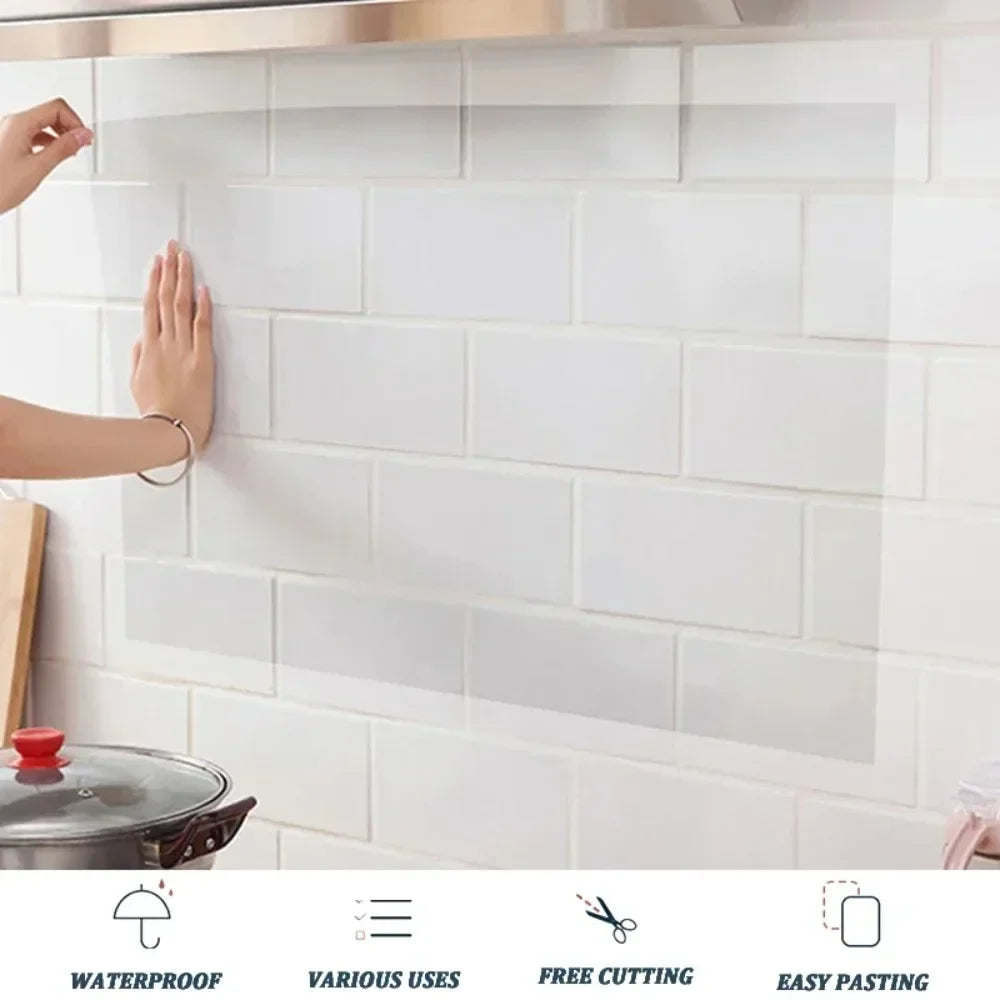 Person applying a white tiled backsplash to a kitchen wall