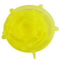 Yellow silicone lid on a white background