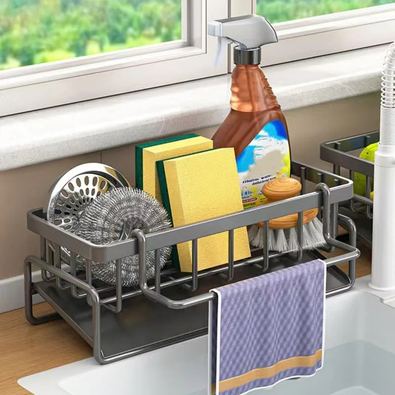 Kitchen sink caddy with cleaning supplies in a kitchen setting