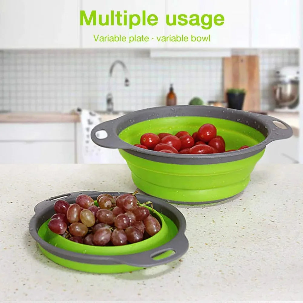Collapsible green and gray bowl with grapes on a kitchen counter