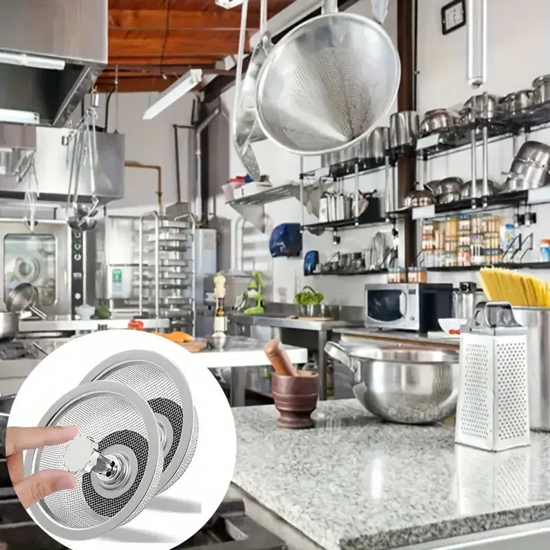 Commercial kitchen with various utensils and appliances, focusing on a close-up of a kitchen filter.