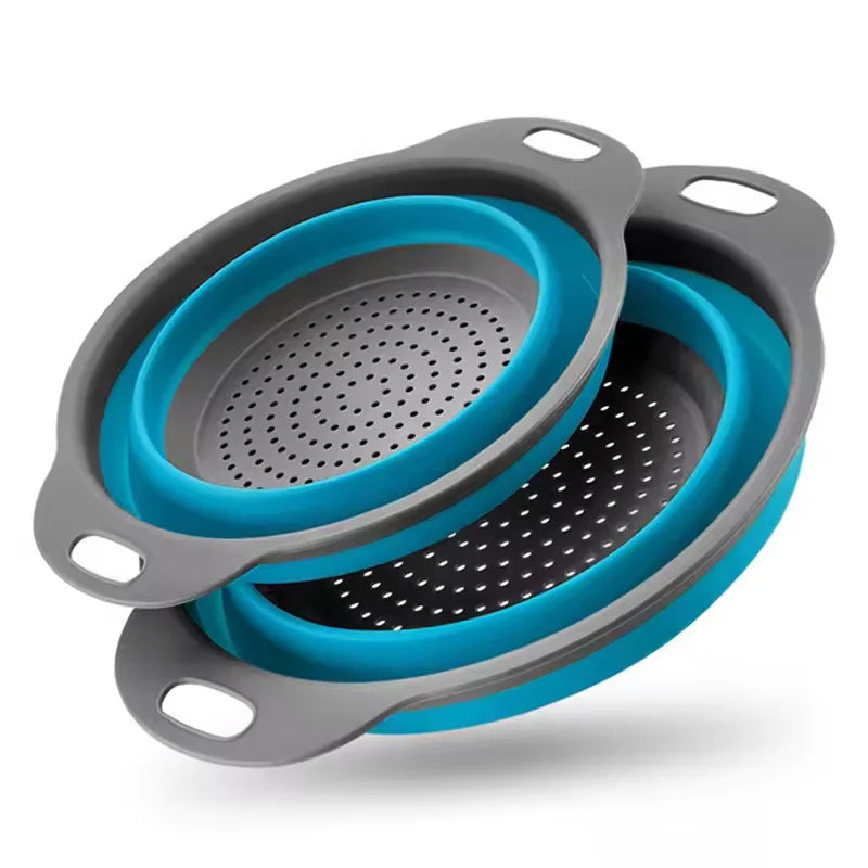Collapsible blue and gray strainer on a white background