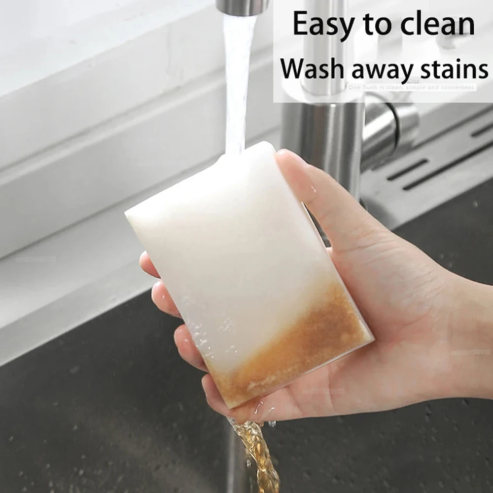 Hand holding a soapy bar under running water with text 'Easy to clean Wash away stains'.