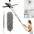 Cleaning tool with extendable handle and feather duster attachment, used to clean a ceiling fan.