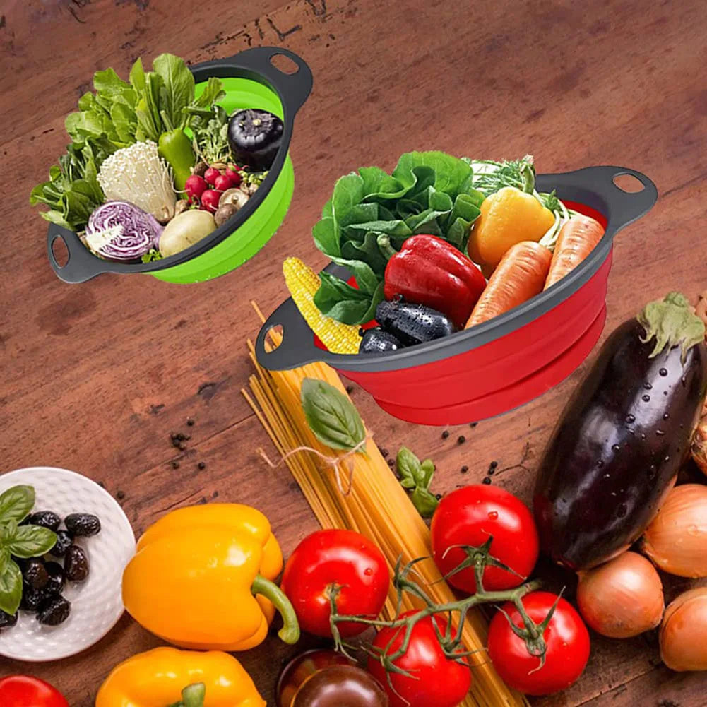 Collapsible vegetable containers with fresh produce on a wooden surface