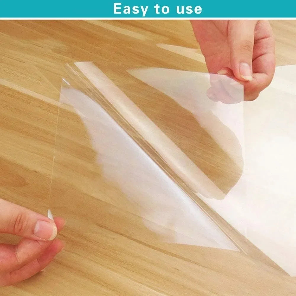 Clear plastic sheet being applied to a wooden surface with text 'Easy to use' at the top.