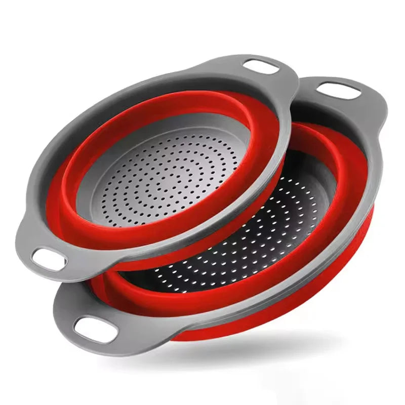 Collapsible red and gray strainer on a white background