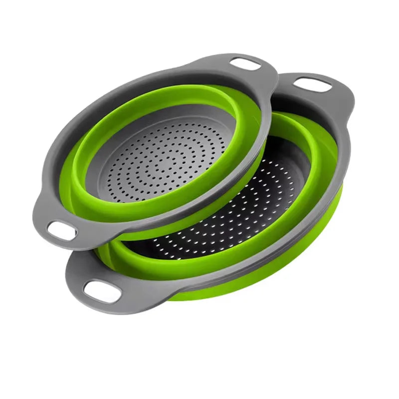 Collapsible colander with green interior and gray exterior on a white background