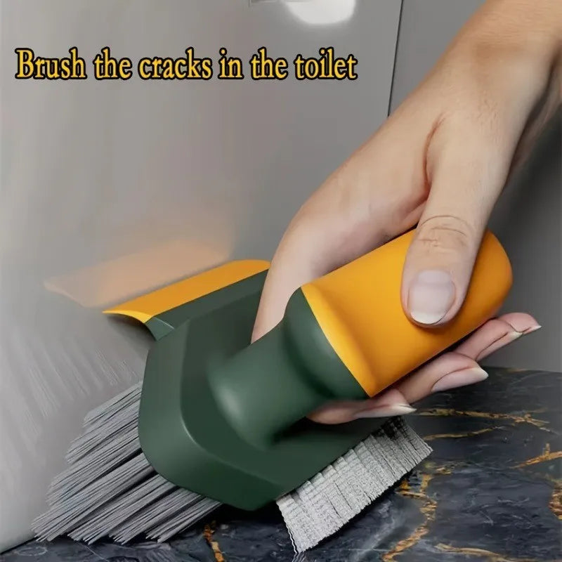 Hand using a green and yellow scrub brush to clean cracks in a toilet.