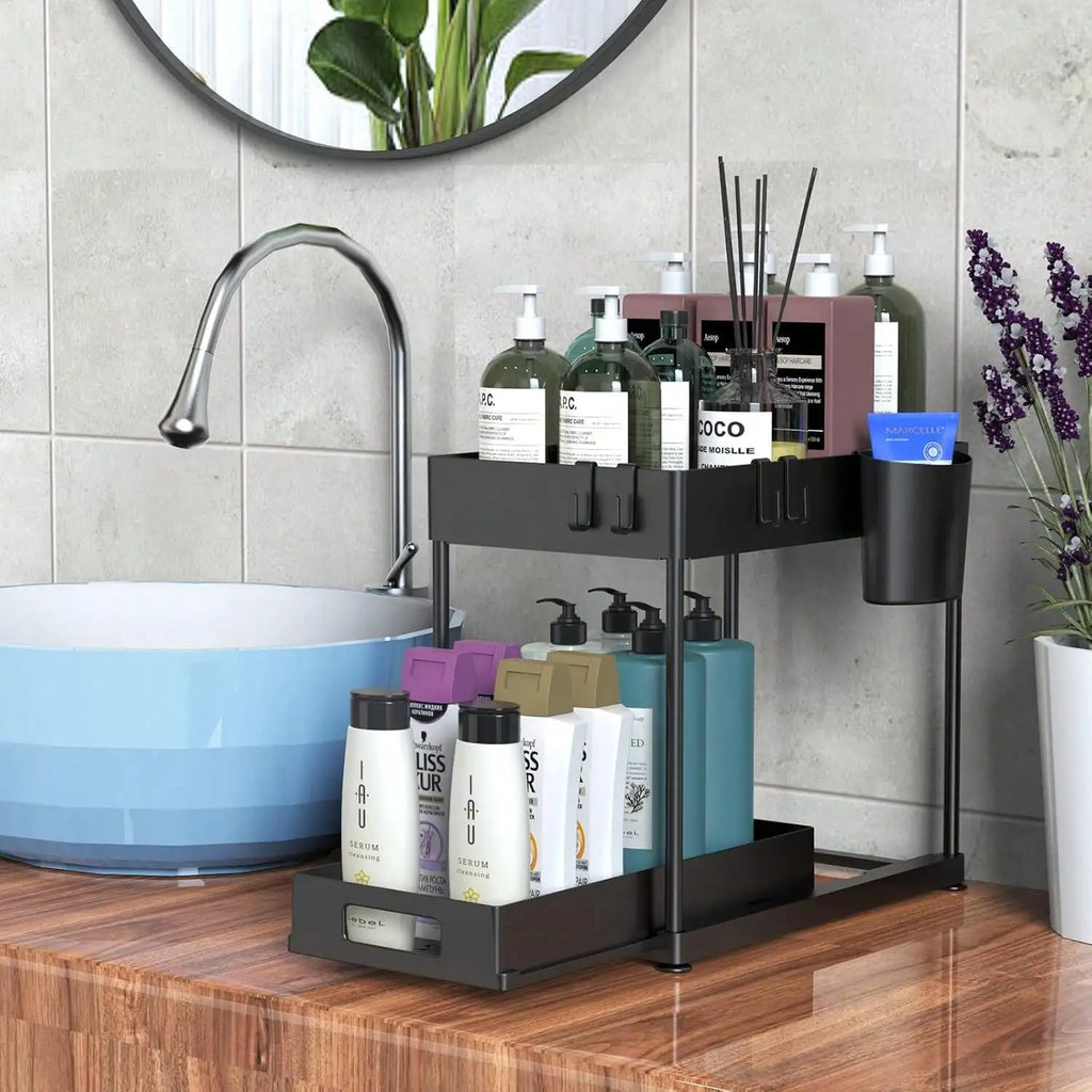 Bathroom counter with a black metal organizer holding various bottles and containers.