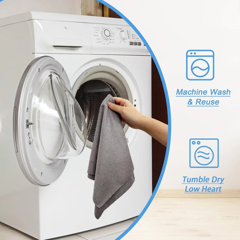Hand holding a gray towel in front of an open dryer with washing and drying icons on a white background.