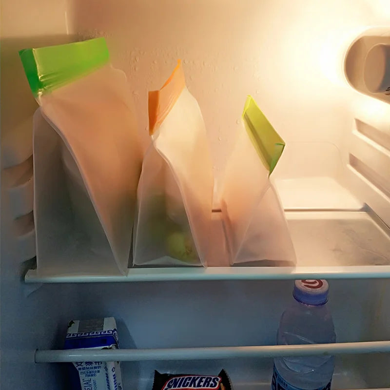 Open refrigerator with food items on a shelf