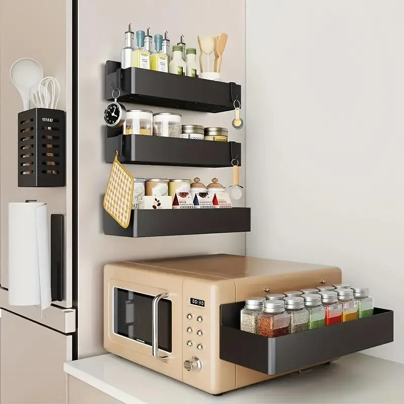 Kitchen setup with a microwave, spice rack, and wall-mounted shelves.