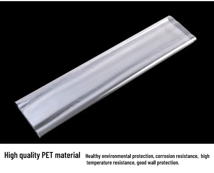 Rectangular white plastic strip with text about high-quality PET material on a black background