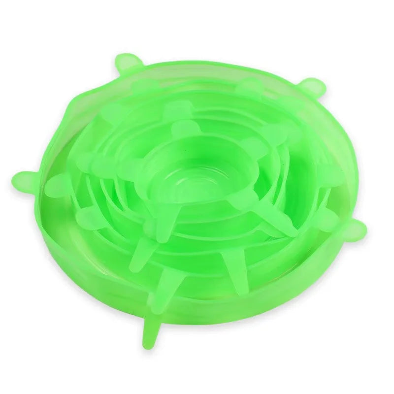 Green silicone lid on a white background