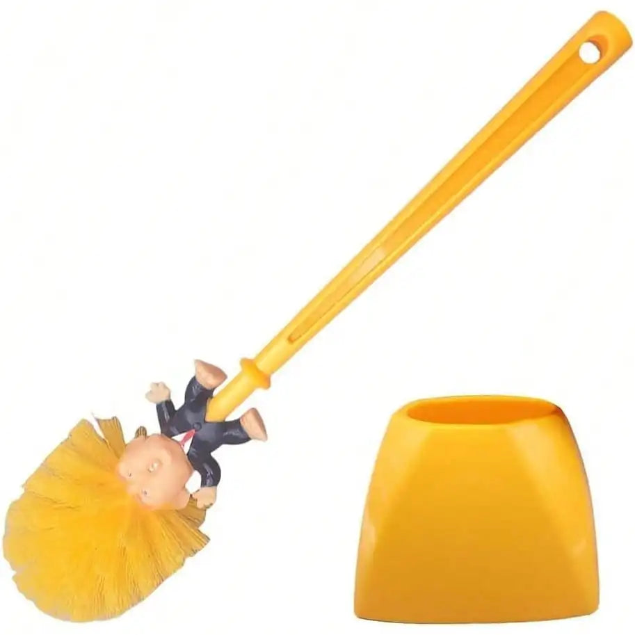 A novelty toilet brush with a miniature figure of Donald Trump on the bristle head, shown alongside its yellow protective cap on a plain white background.