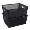 Two black storage baskets on a white background