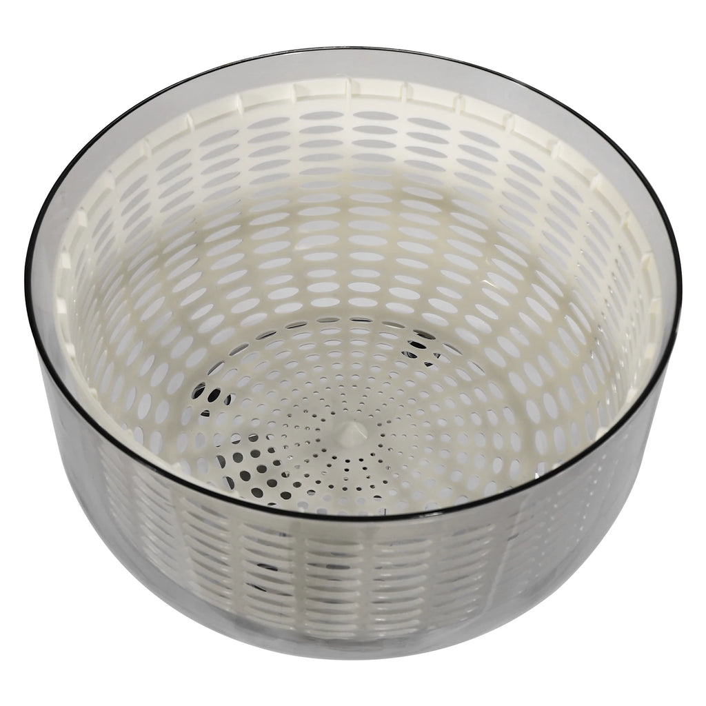 A clear plastic salad spinner bowl with a white inner basket and perforated holes, shown on a plain white background.